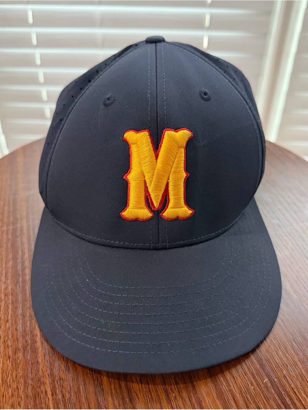 Black Baseball Cap with Yellow 'M' Embroidered Logo